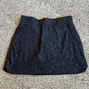 Orvis Black on black embossed sport tennis skort. Size S